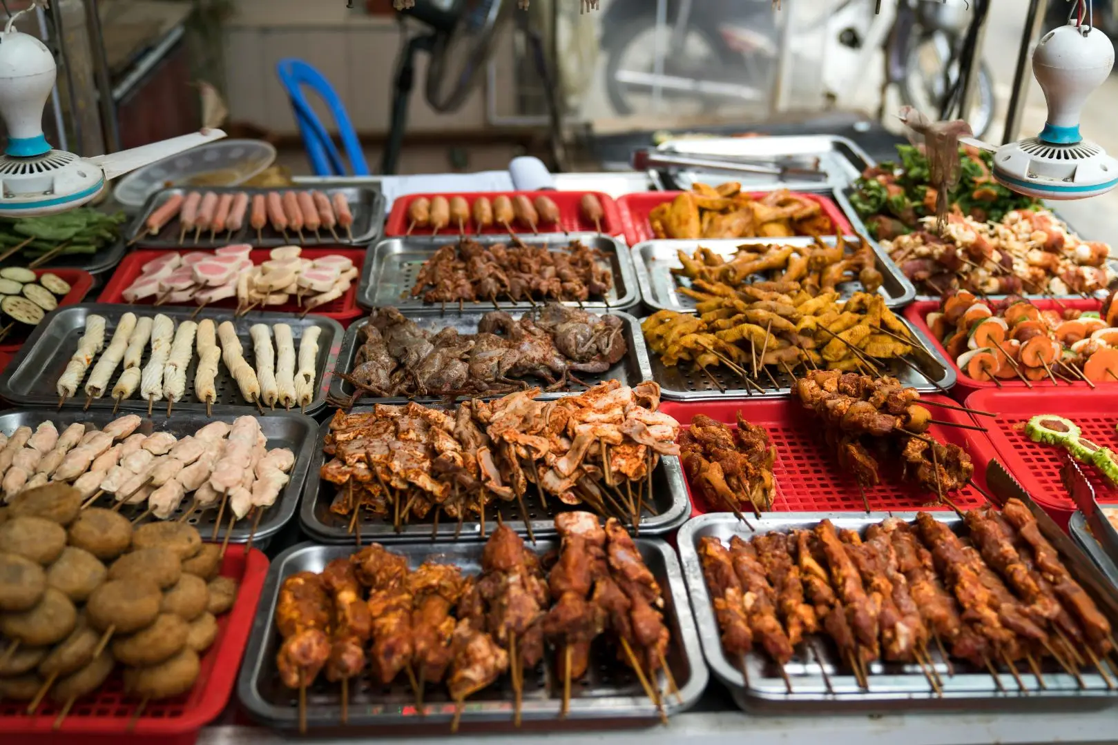 Delicious and affordable local street food, freshly prepared and served at a vibrant market stall, showcasing authentic flavors and ingredients.